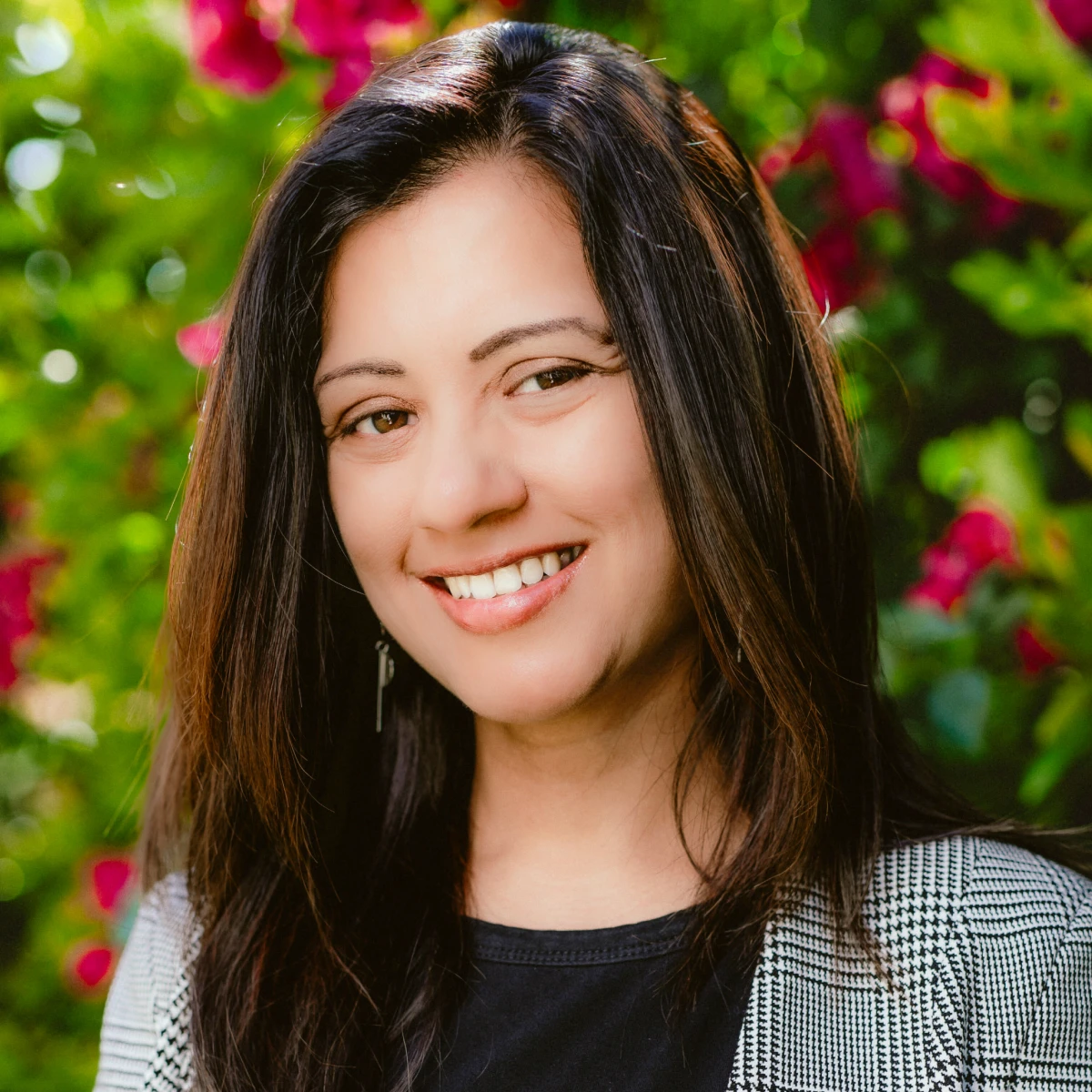 A headshot of the team member.