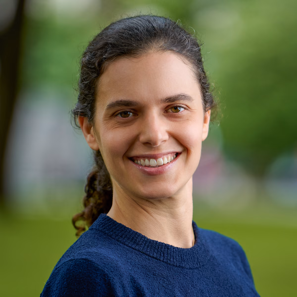 A headshot of the team member.