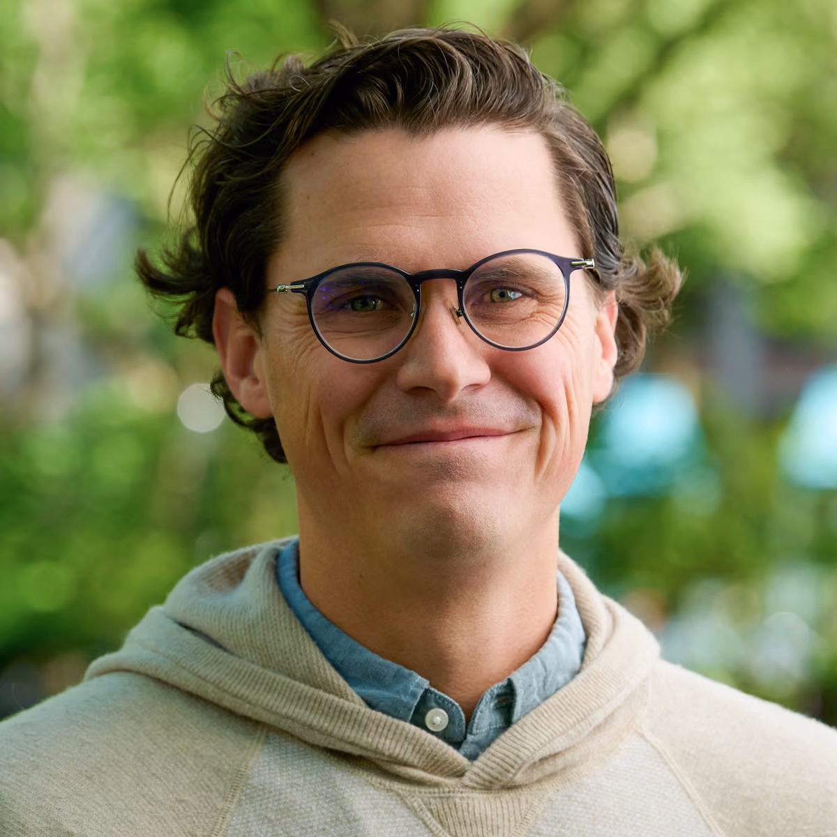 A headshot of the team member.
