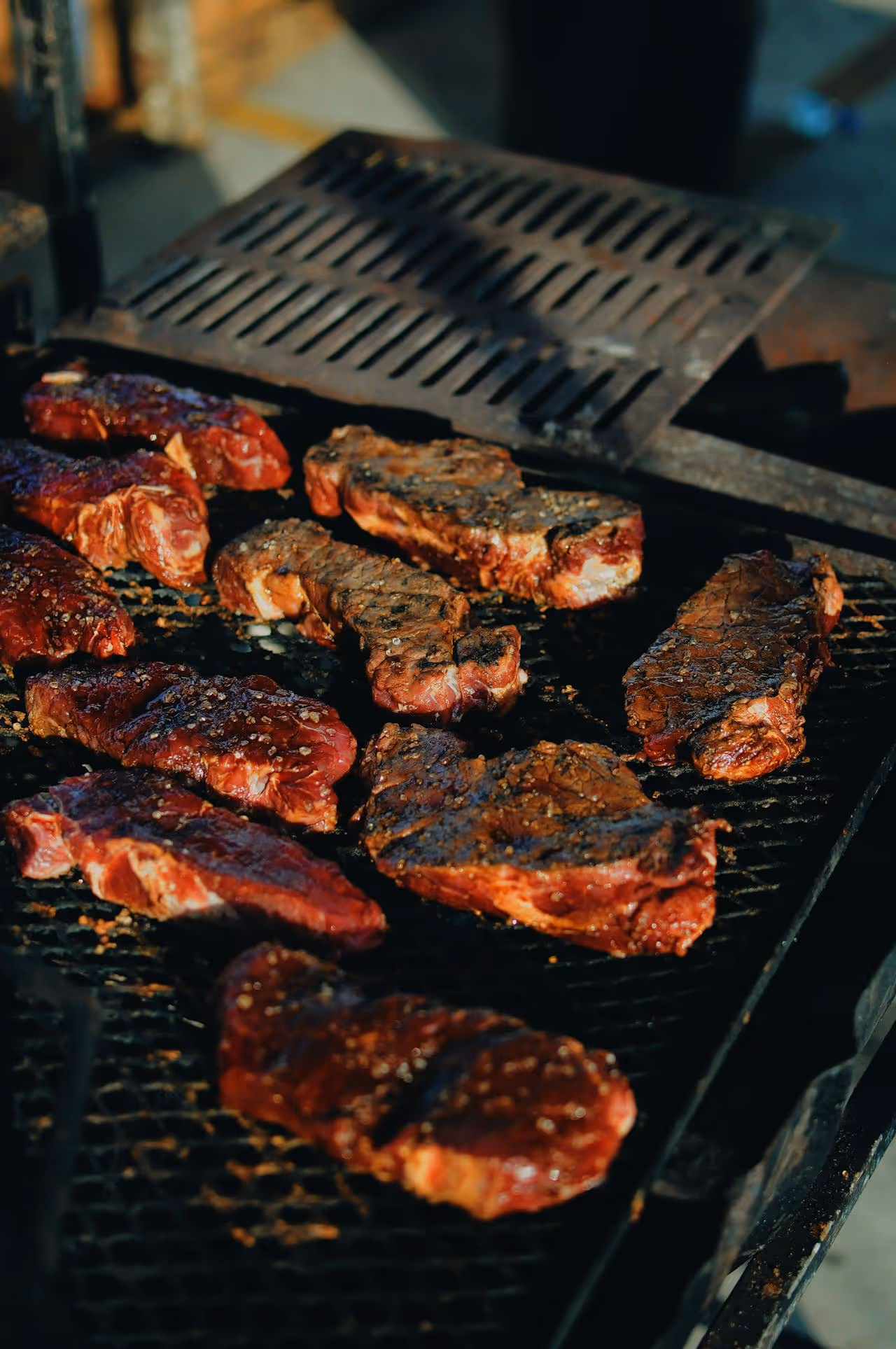 A grilled steak with a brown crust.