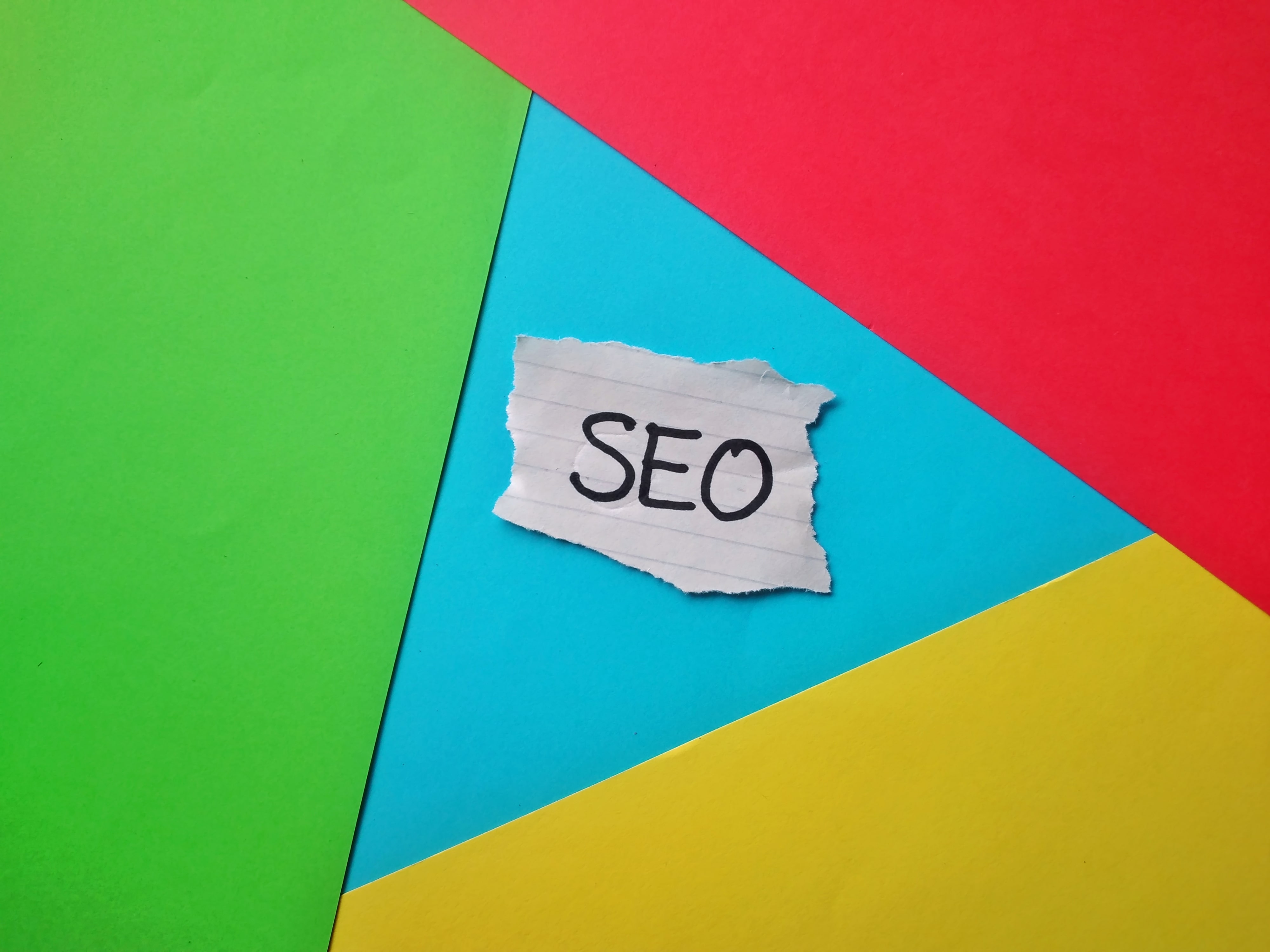 SEO spelled with background colors