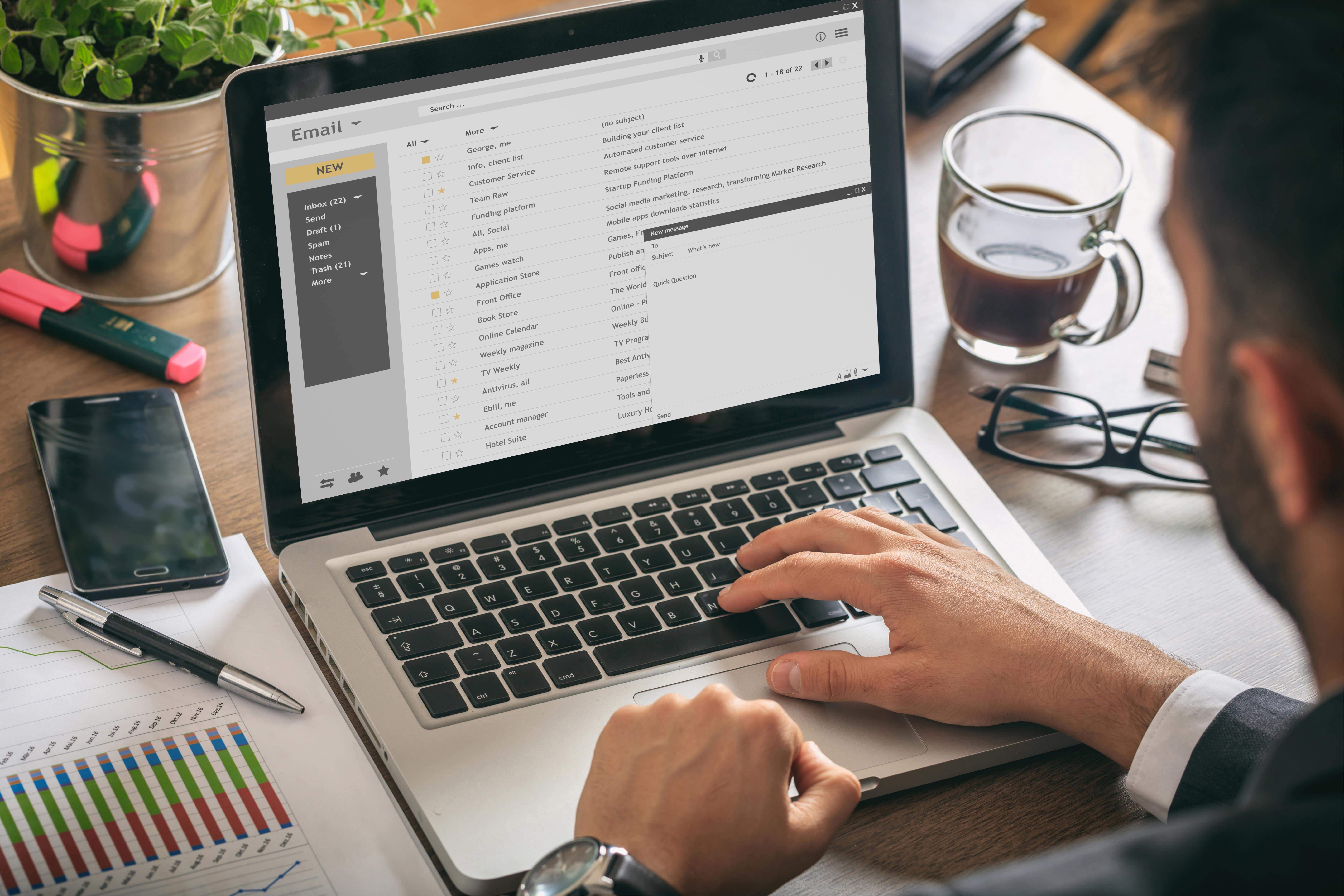 man working on an email list