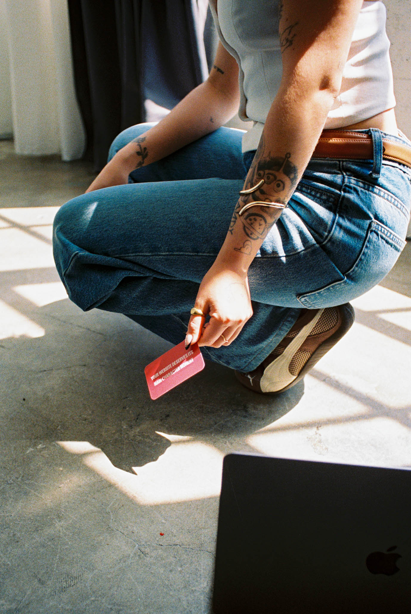 Mayra holding a business card