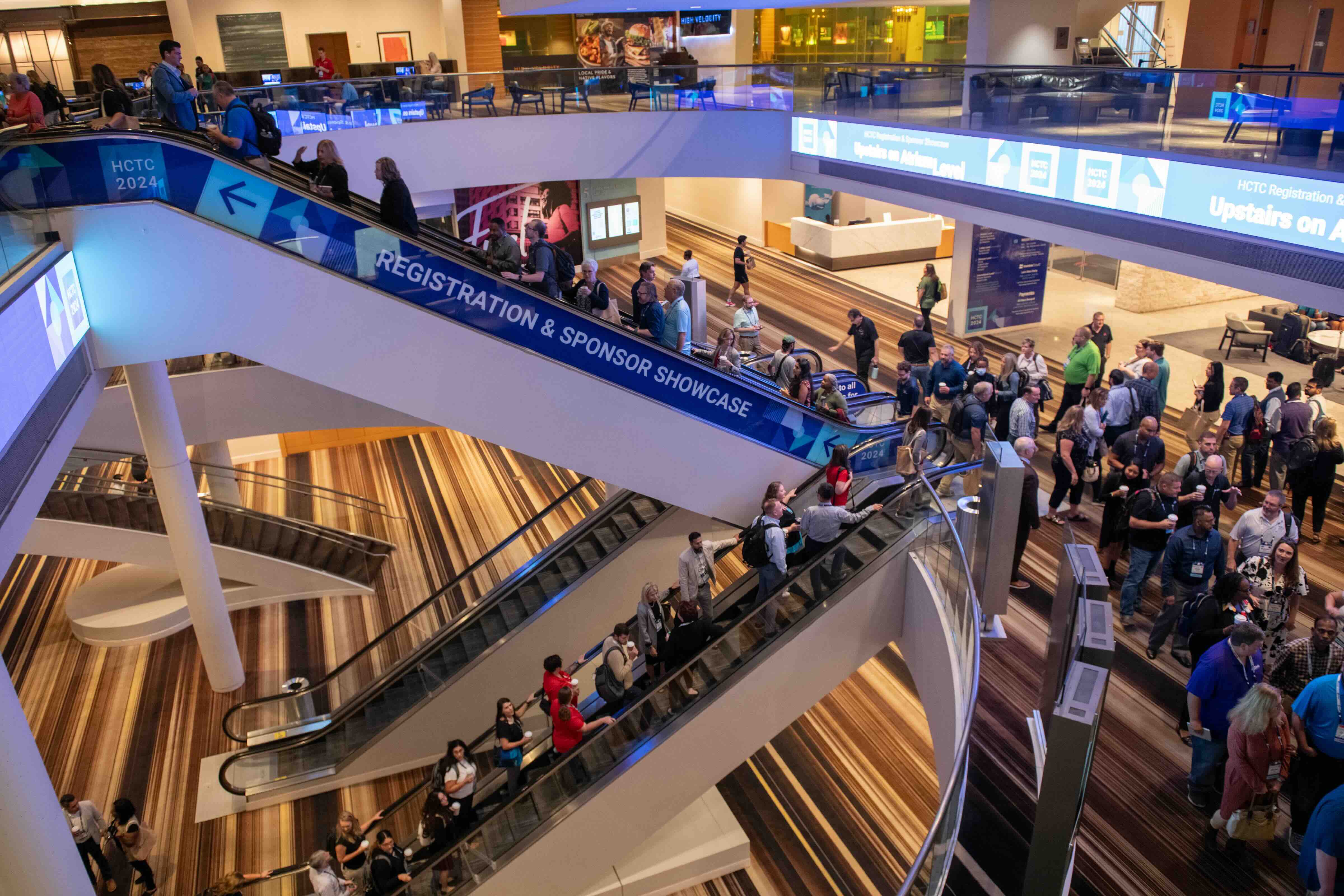 Busy escalator at HCTC 2024.