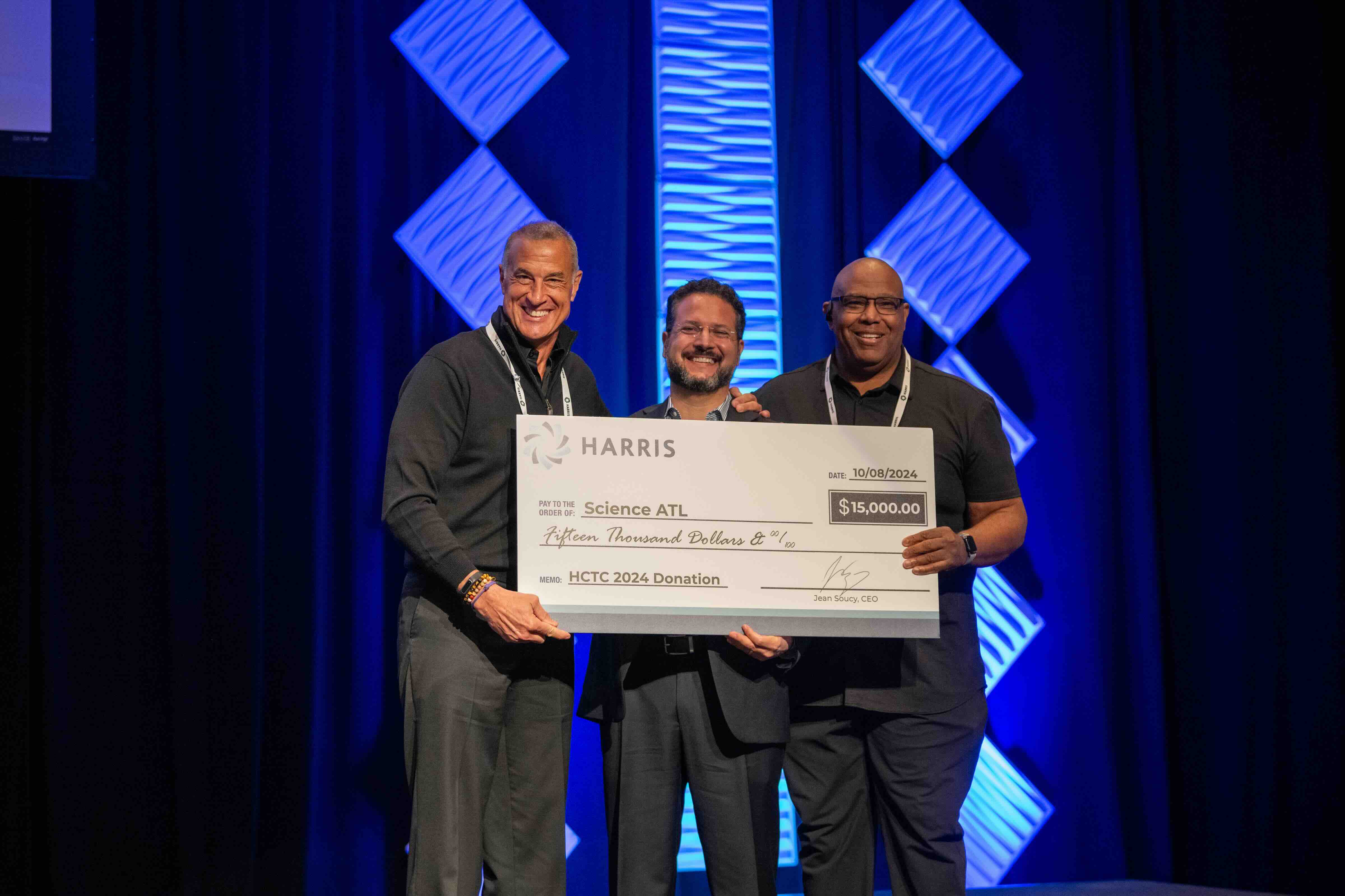 Harris donation check to Science ATL.