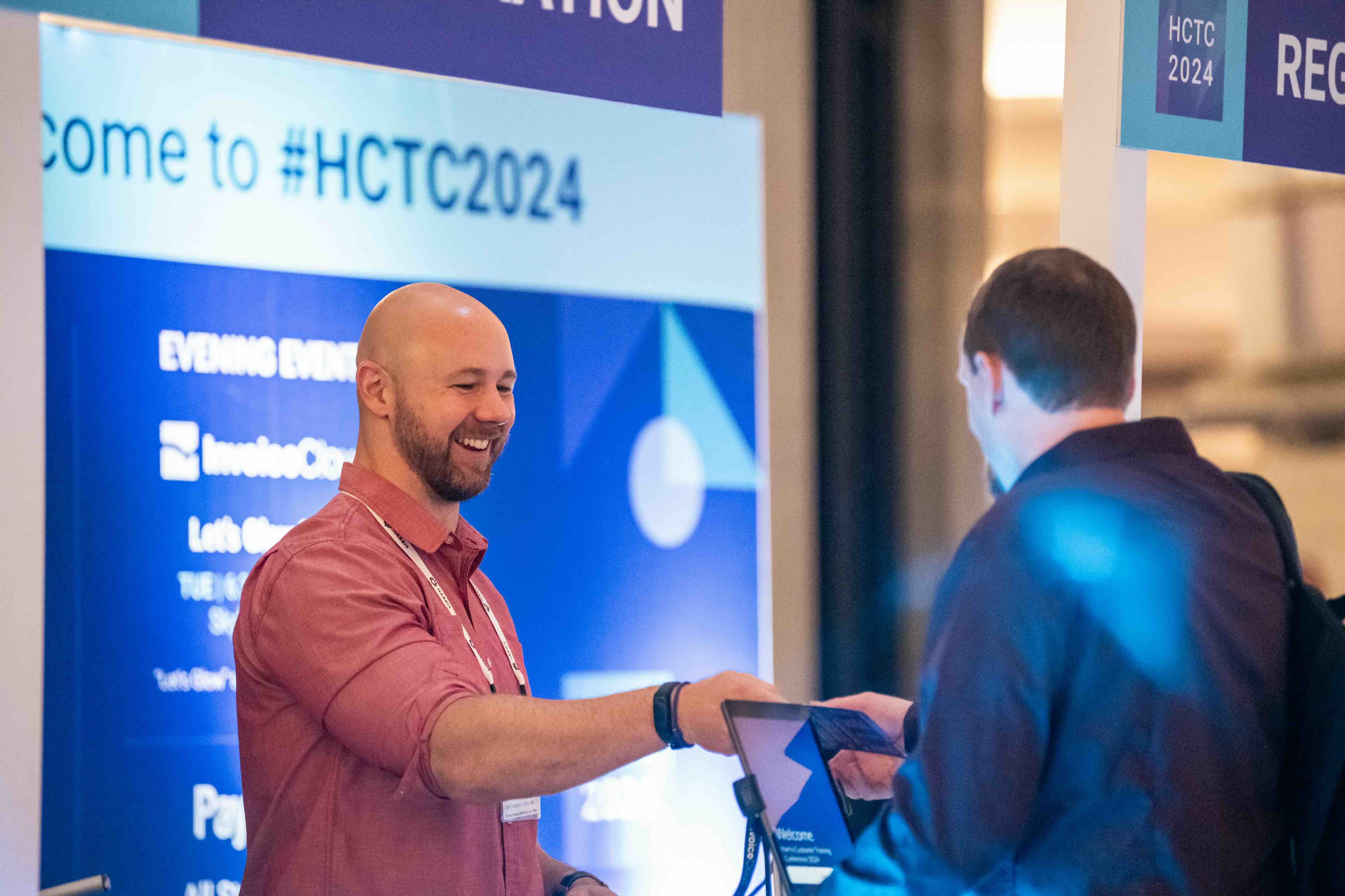 HCTC 2024 registration check-in desk.
