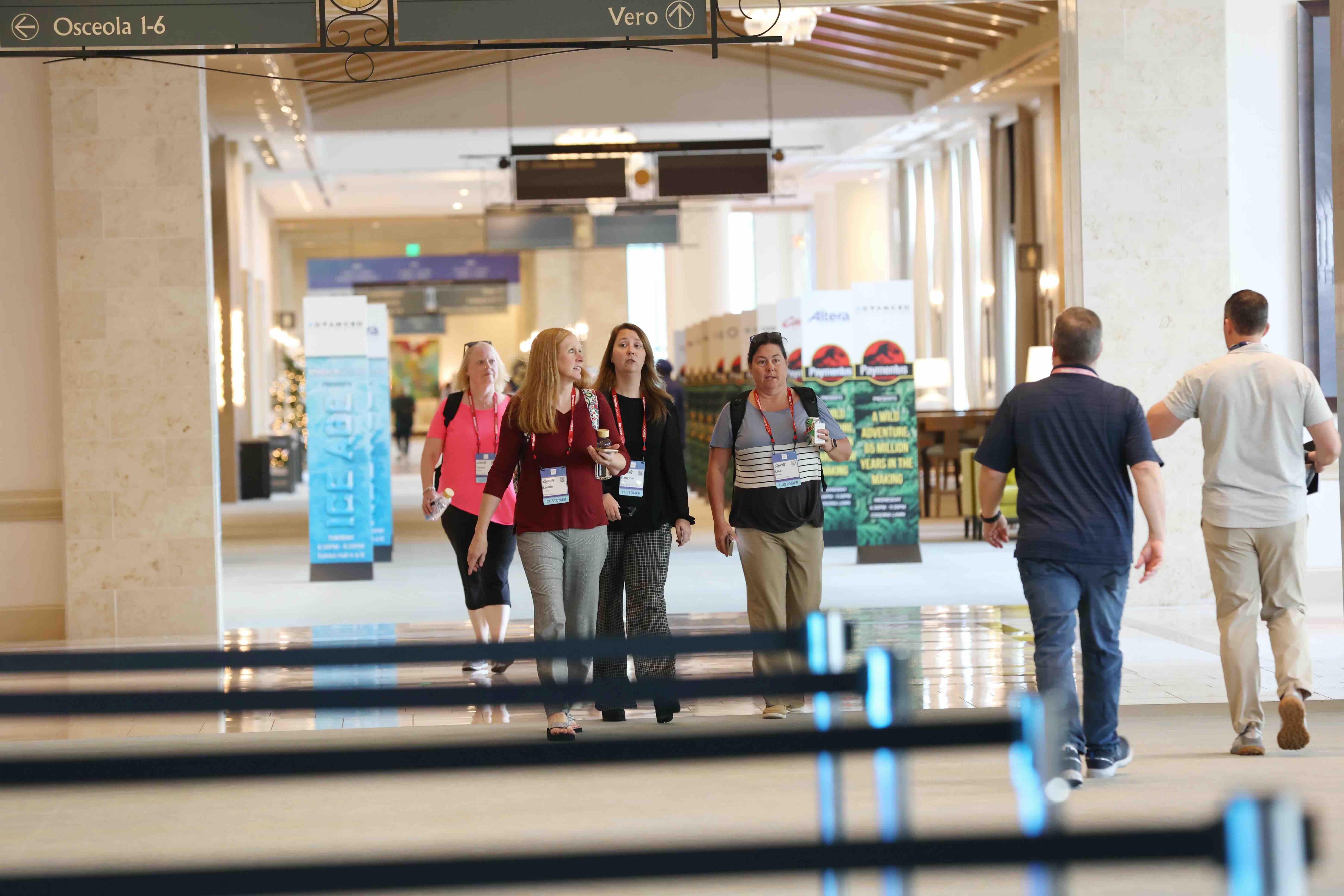 HCTC customers walking to sessions.