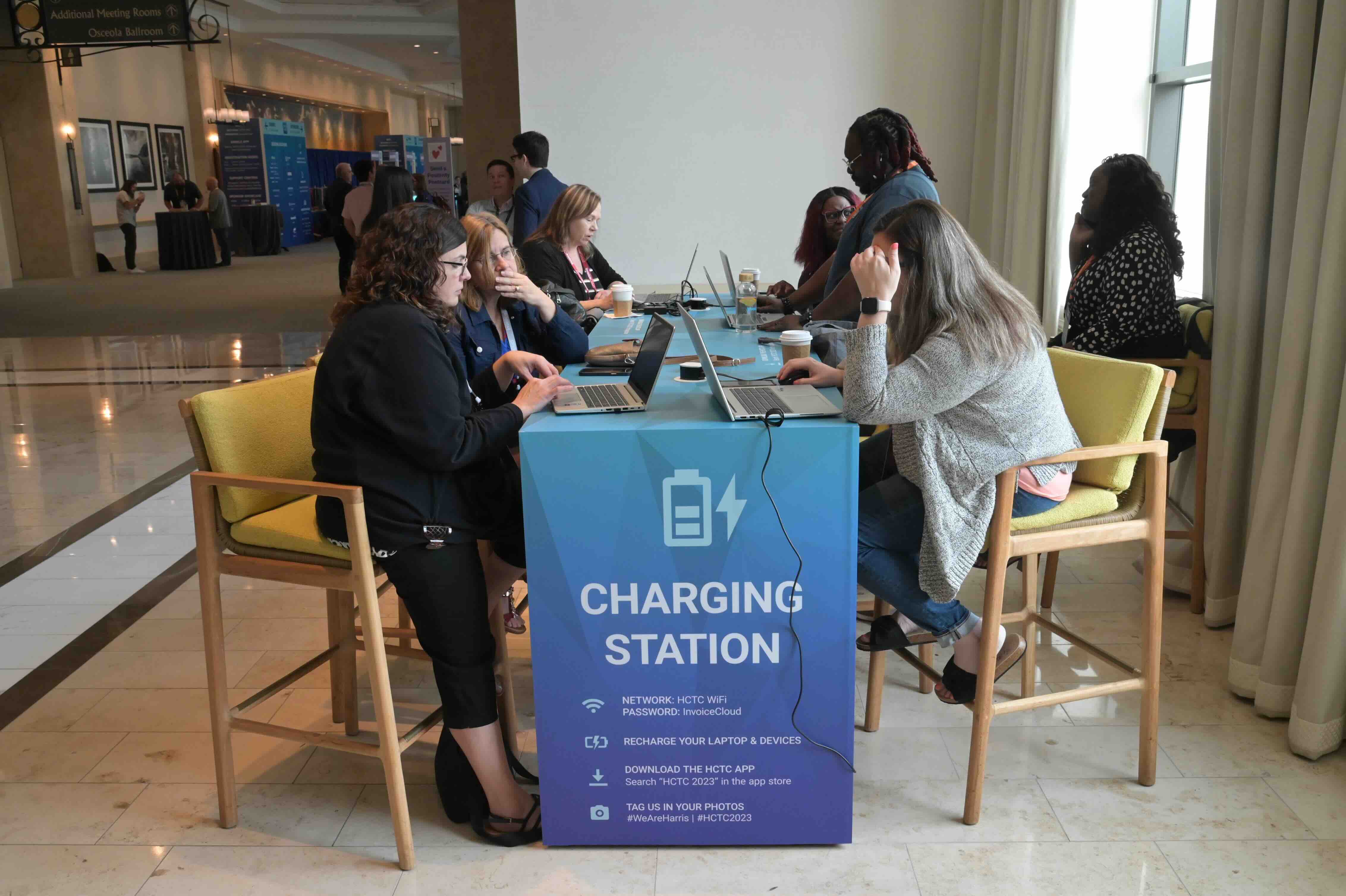 HCTC customers using charging stations.
