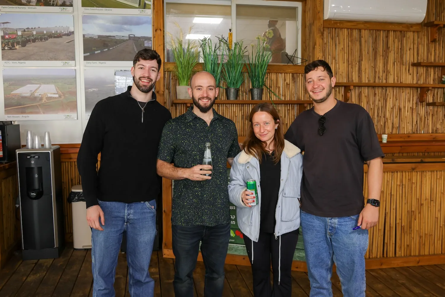 A group of people standing next to each other.