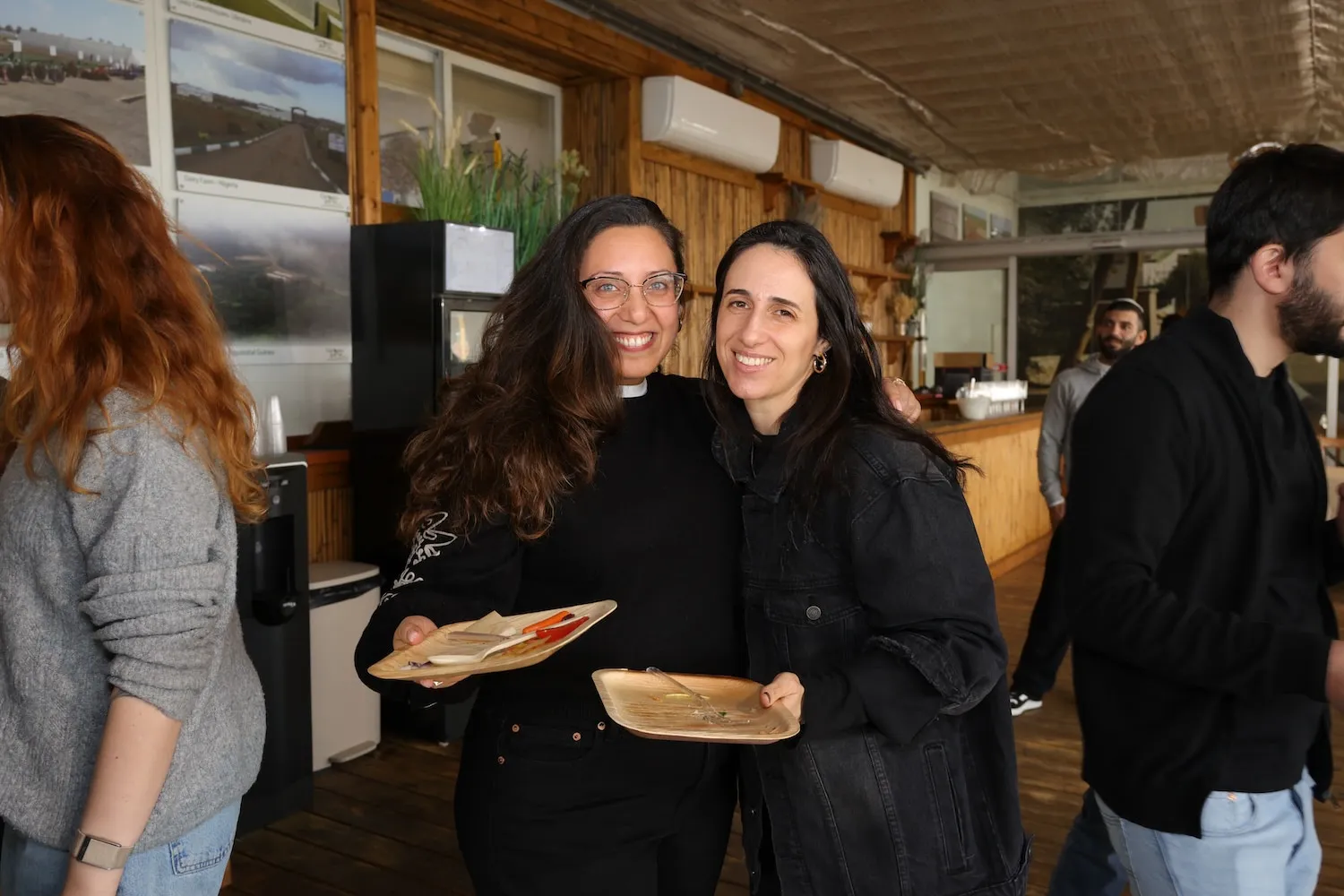 A group of people standing next to each other.