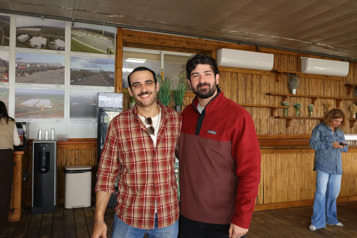 A couple of men standing next to each other.