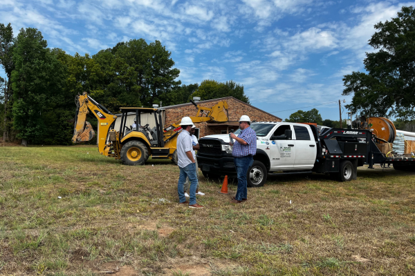 BASS field crew drilling into the ground at a Houston, TX job site to support cathodic protection system installation, anode placement, and long-term pipeline corrosion control for industrial infrastructure.