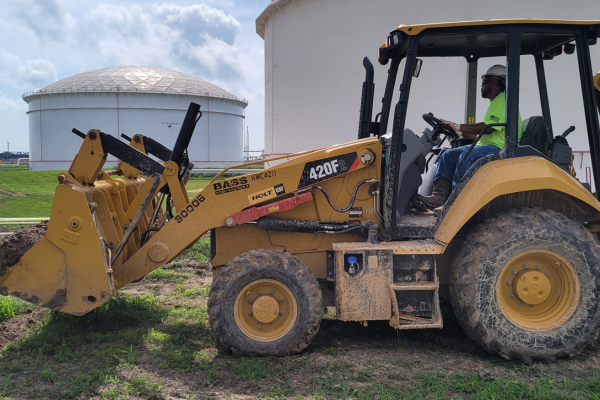 BASS technicians performing cathodic protection maintenance on pipeline infrastructure in the field