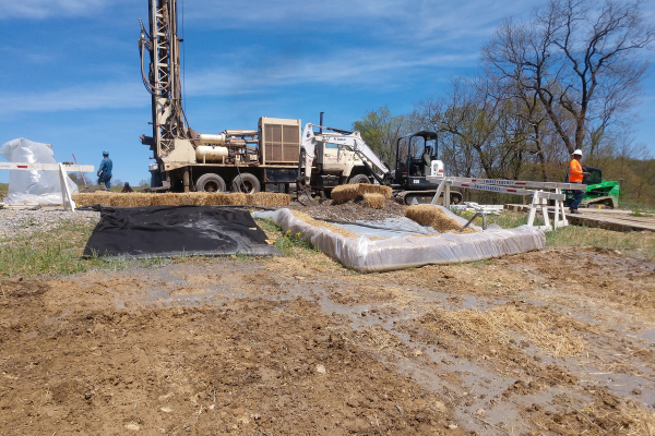 BASS technicians performing cathodic protection maintenance on pipeline infrastructure in the field