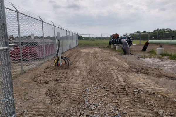 BASS technicians performing cathodic protection maintenance on pipeline infrastructure in the field