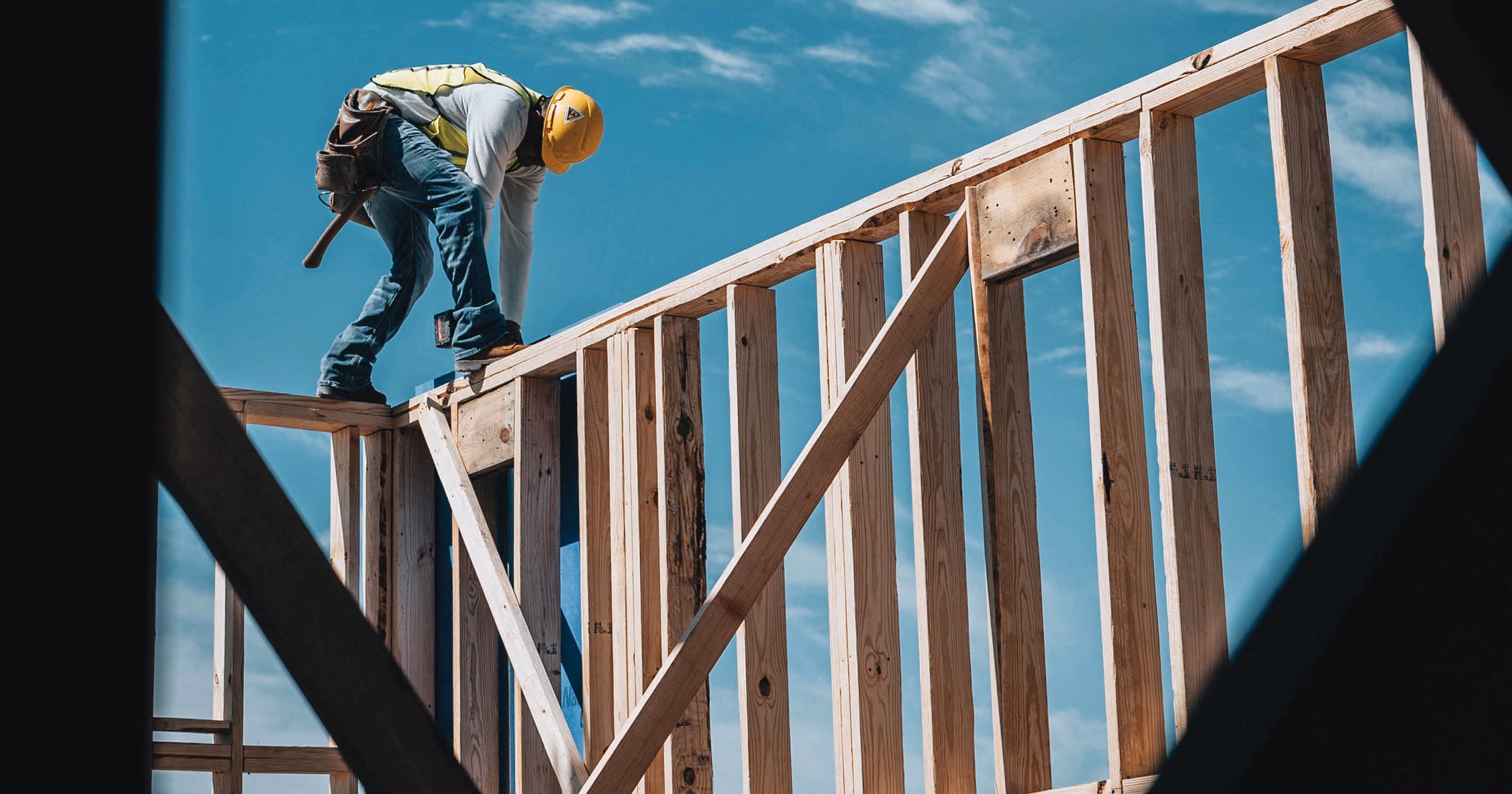 A builder building a house