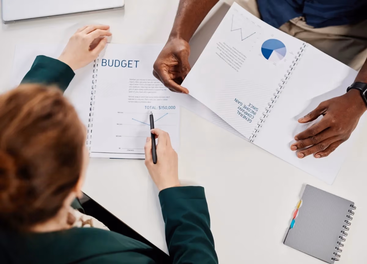 Businesspeople reviewing budget