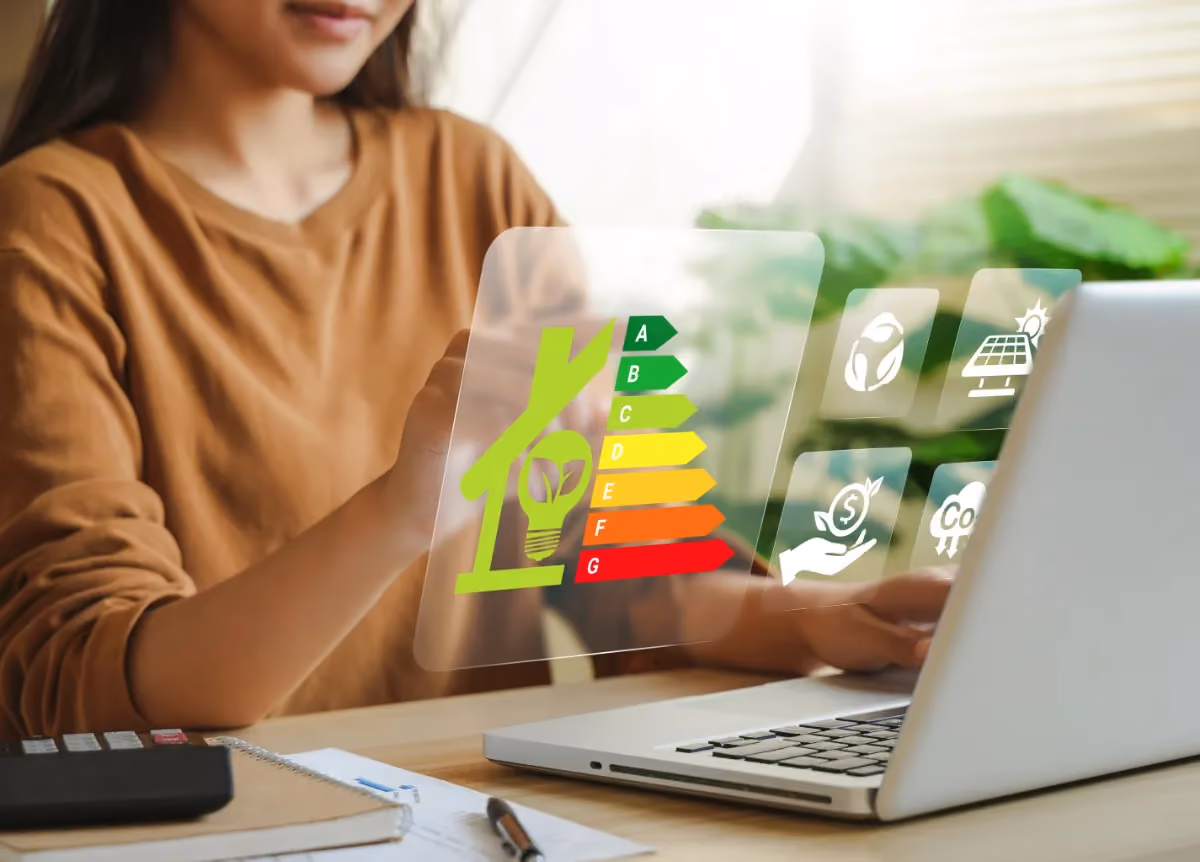 A woman looking at a laptop screen with an EPC chart