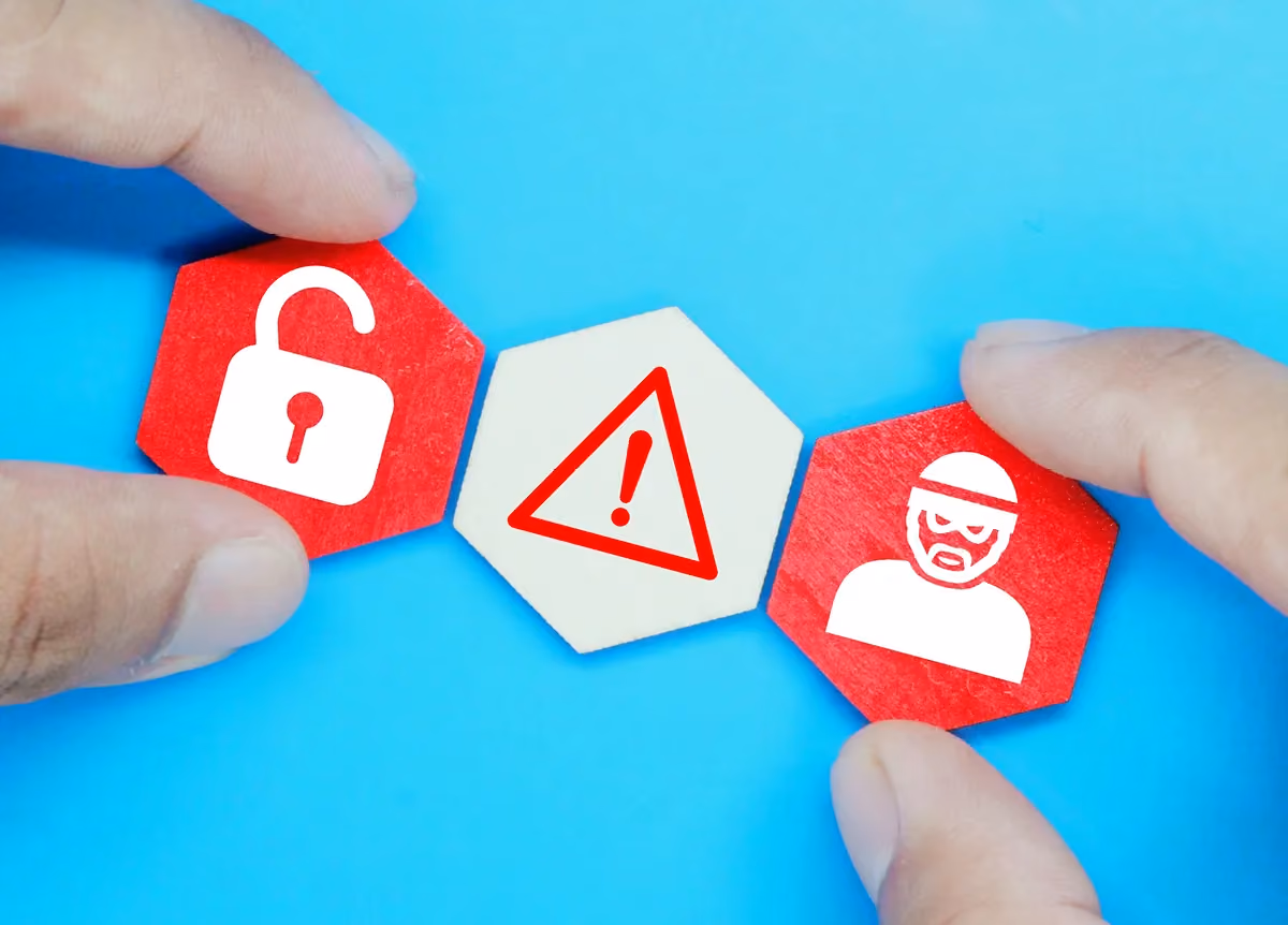 Three hexagons with criminal, warning sign, and padlock icons on them