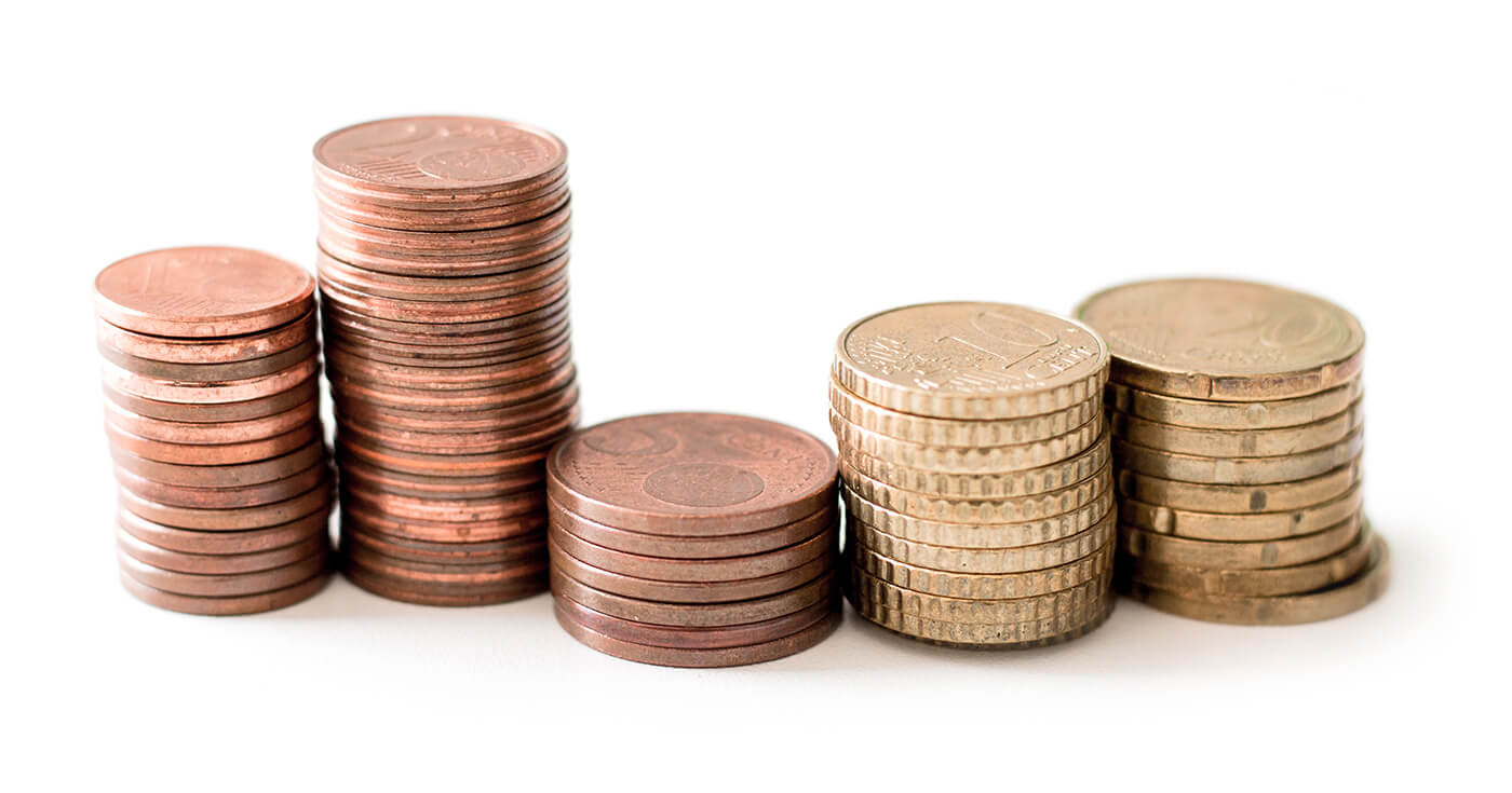 A stack of coins on a white background