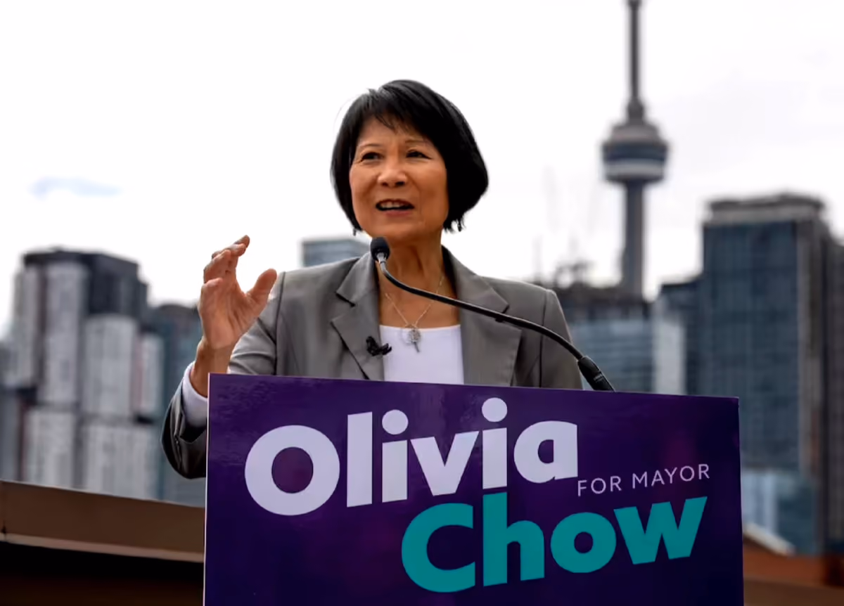 Mayoral candidate Olivia Chow speaking at podium