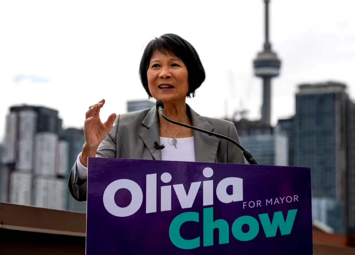 Mayoral candidate Olivia Chow speaking at podium