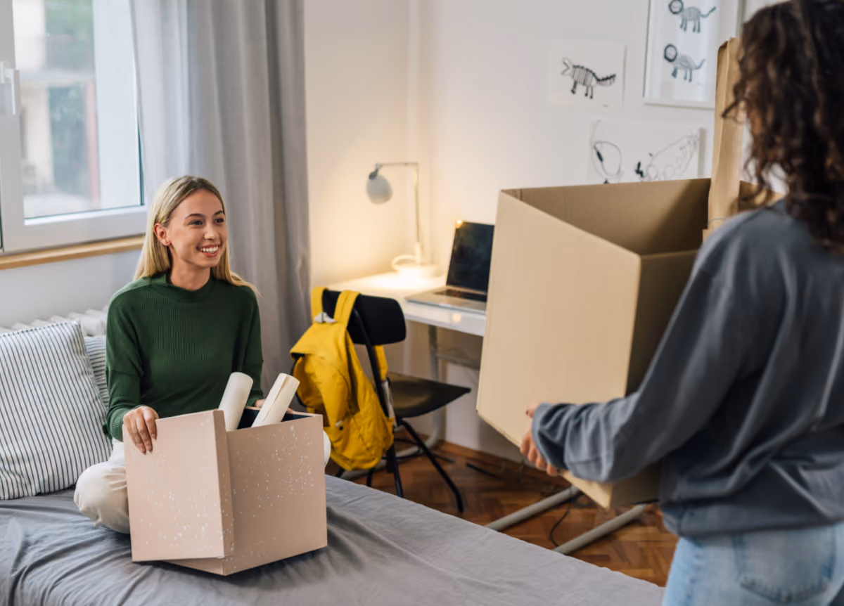 Female college students moving in together