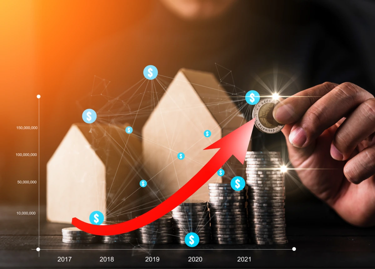 Stacks of coins on chart with growing value on black background