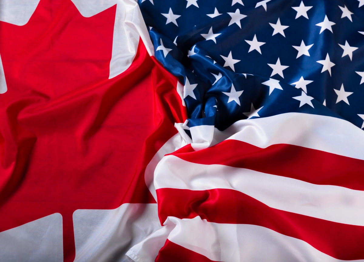 US and Canadian flags