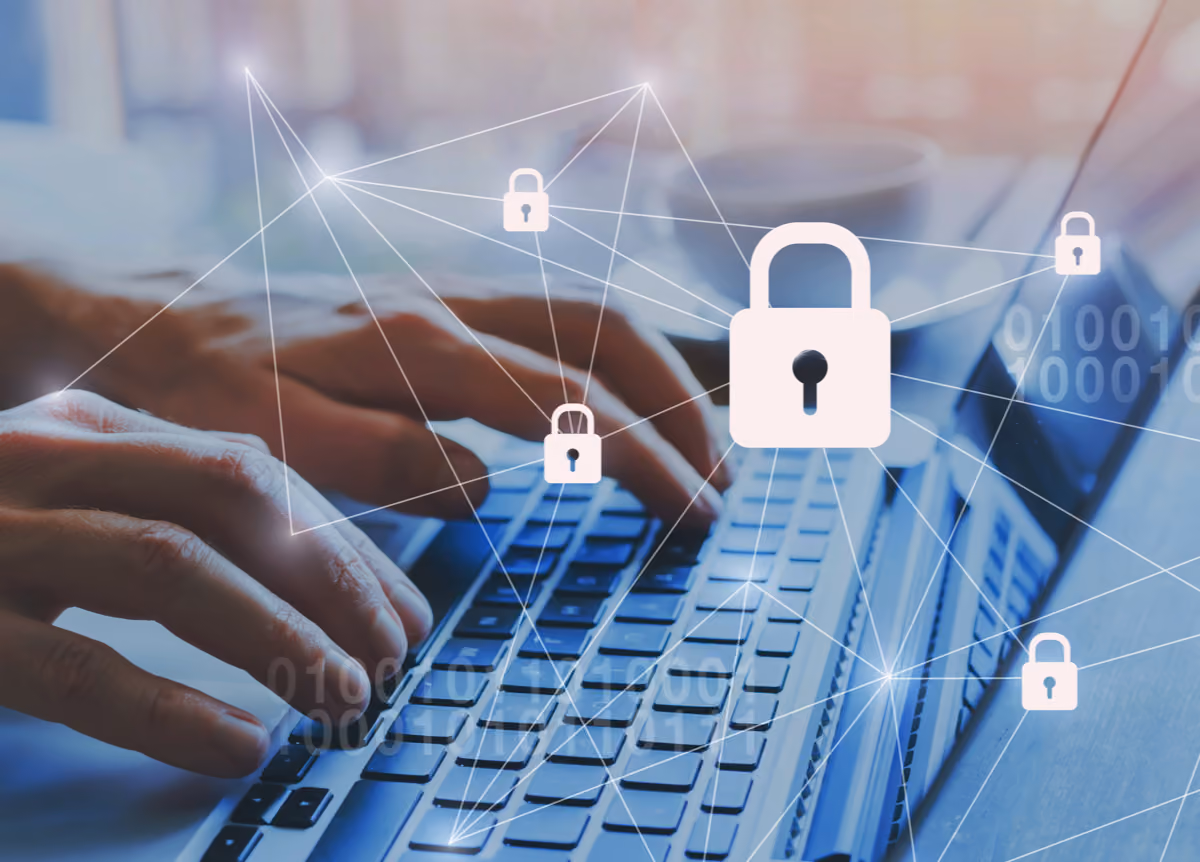 Padlock icons layered over man using a laptop