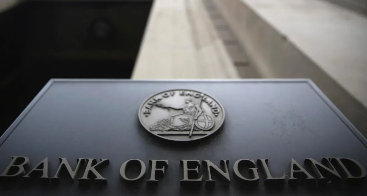 The Bank of England emblem at the front of a building
