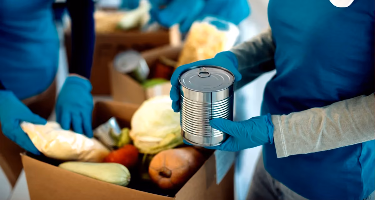 People handing out food at a food bank