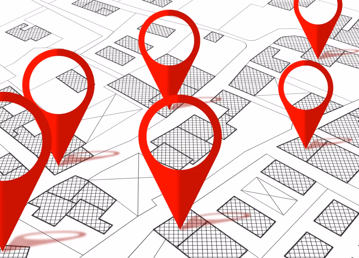 Imaginary cadastral map dotted with red pin icons