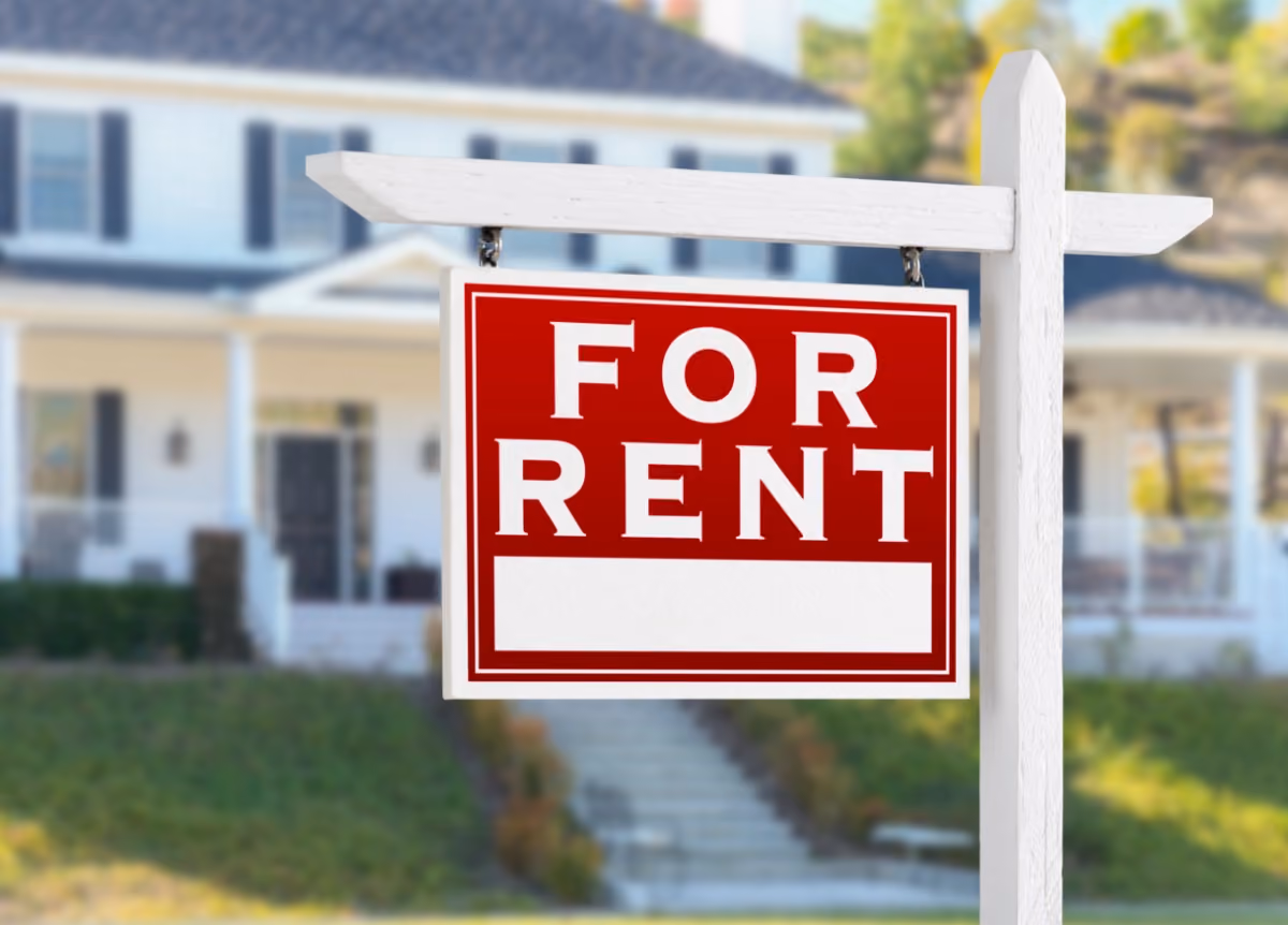 House with "for rent" sign