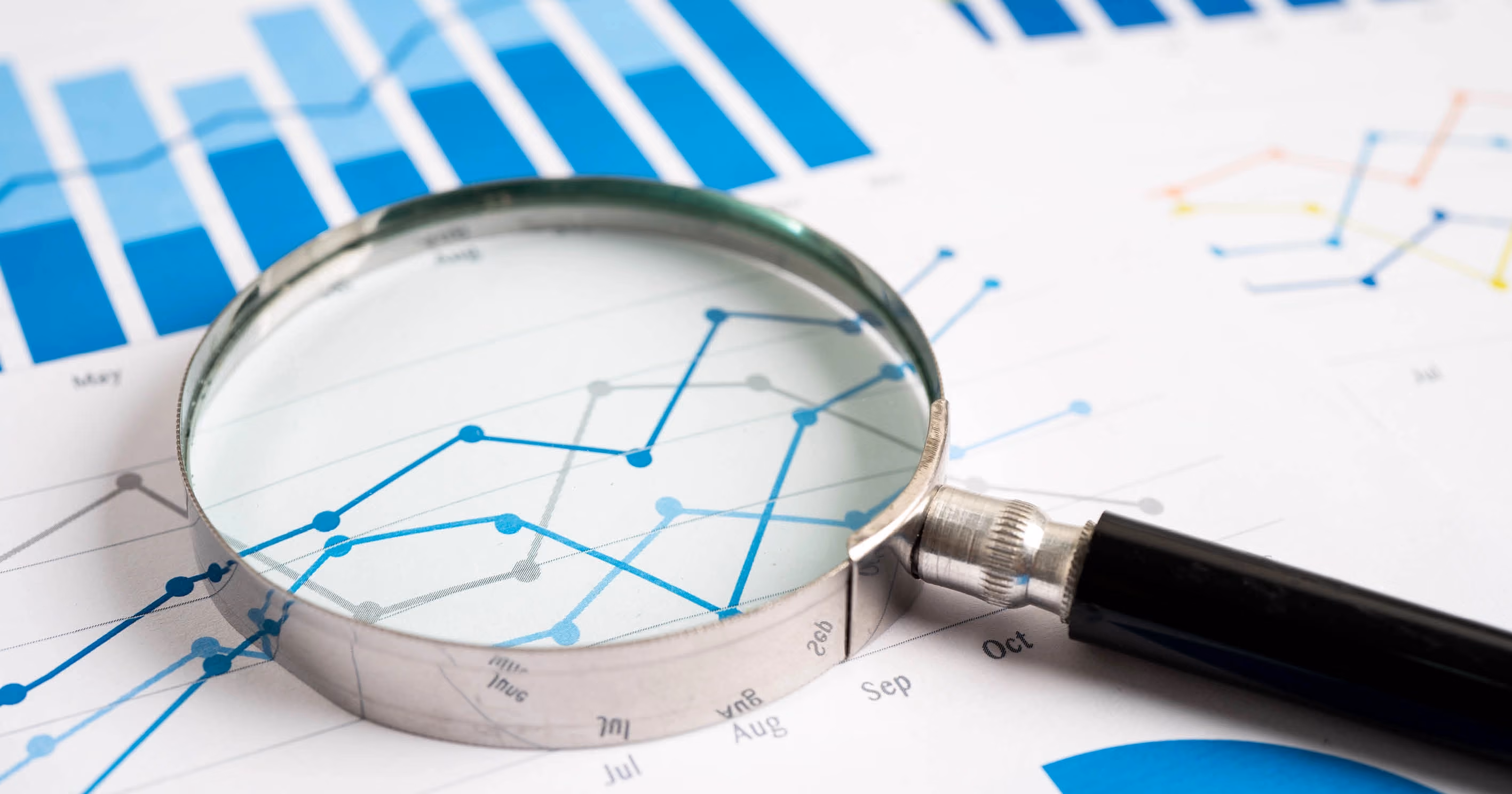 A magnifying glass on a graph