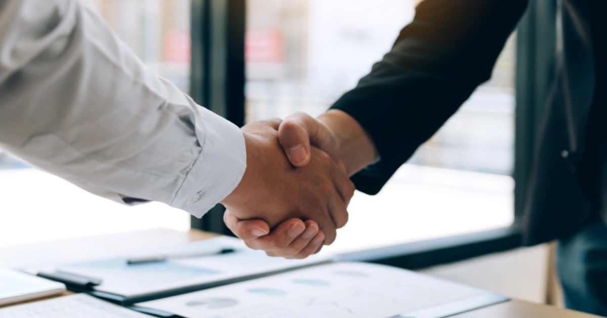 Two people shaking hands