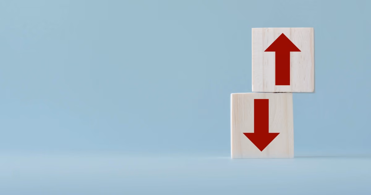 Two arrows, one pointing up and one pointing down, on a blue background