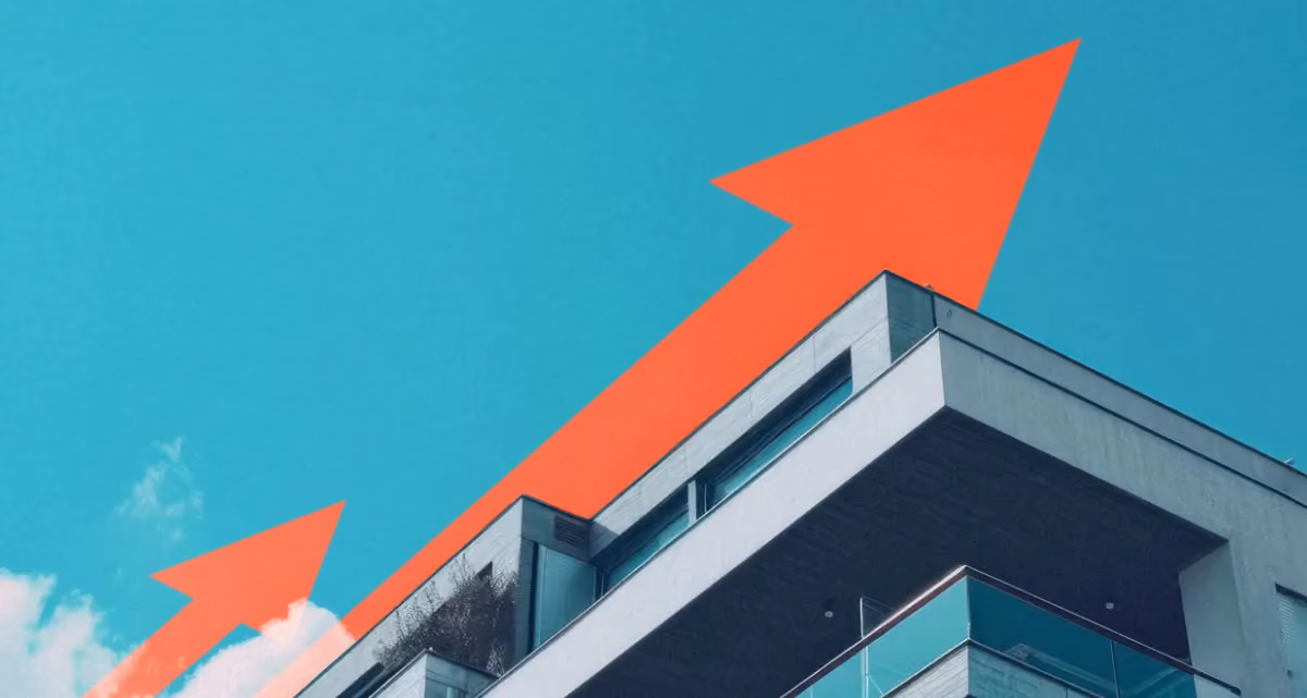 A graphic of a red arrow rising into a blue sky above the roof of a building
