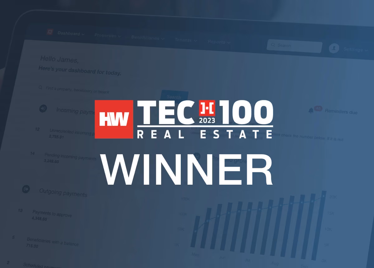 HousingWire Tech100 Real Estate Award logo in front of PayProp dashboard