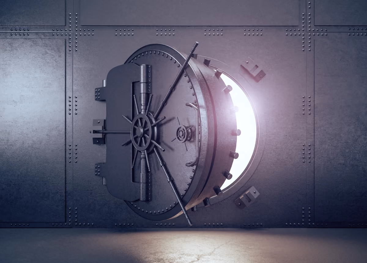 A picture of a bank vault door slightly open