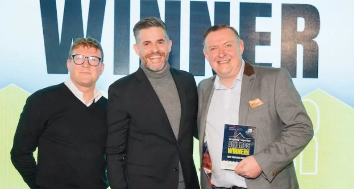 PayProp UK Managing Director Neil Cobbold holding an award at the Property Reporter Awards
