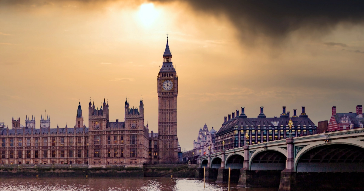 A view of the Houses of Parliament in Westminster at sunset