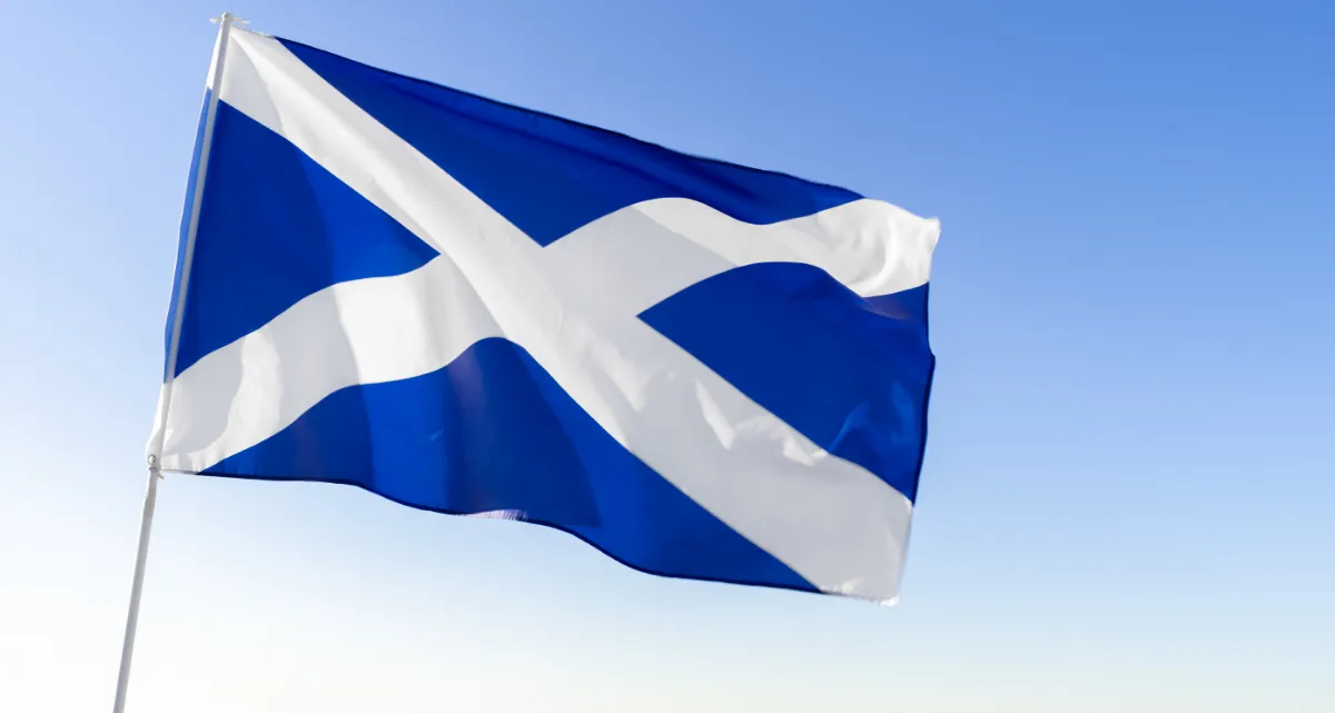 The Scottish flag against a blue sky