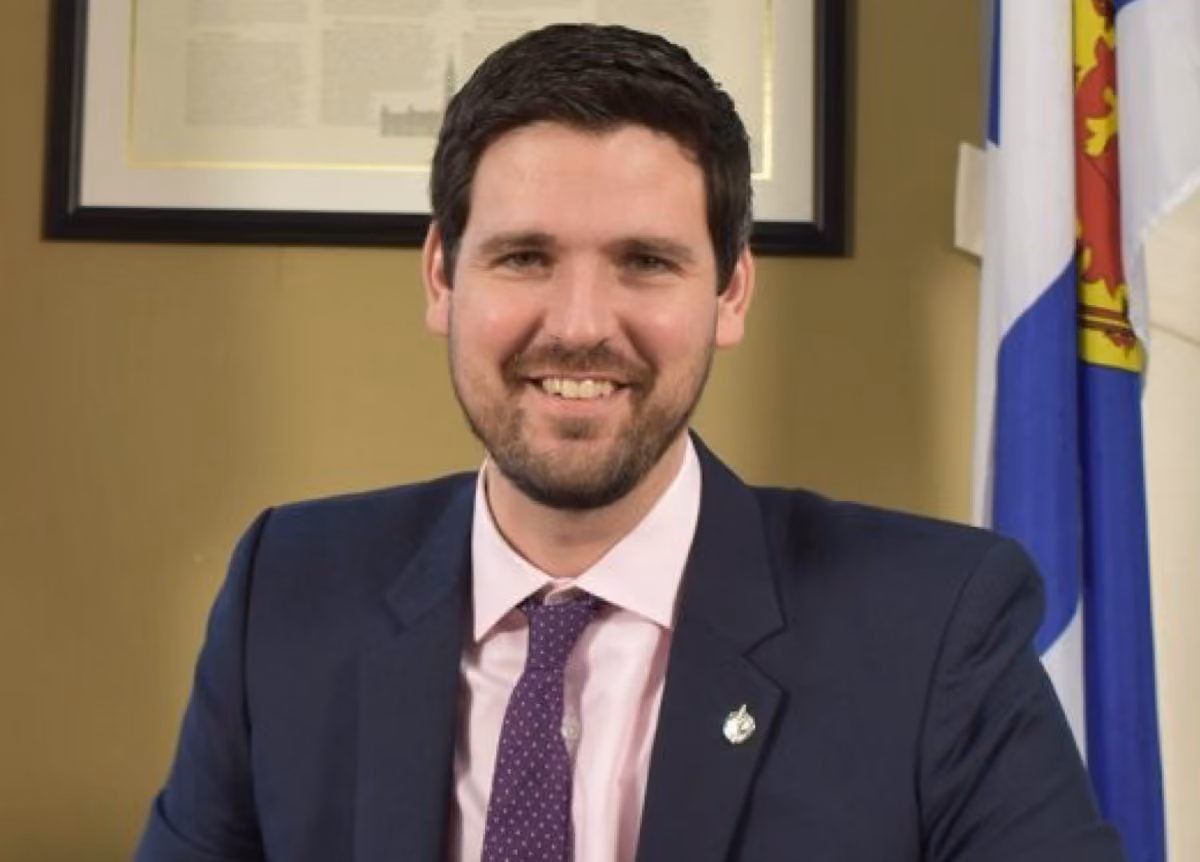 Minister of housing, infrastructure and communities Sean Fraser smiling