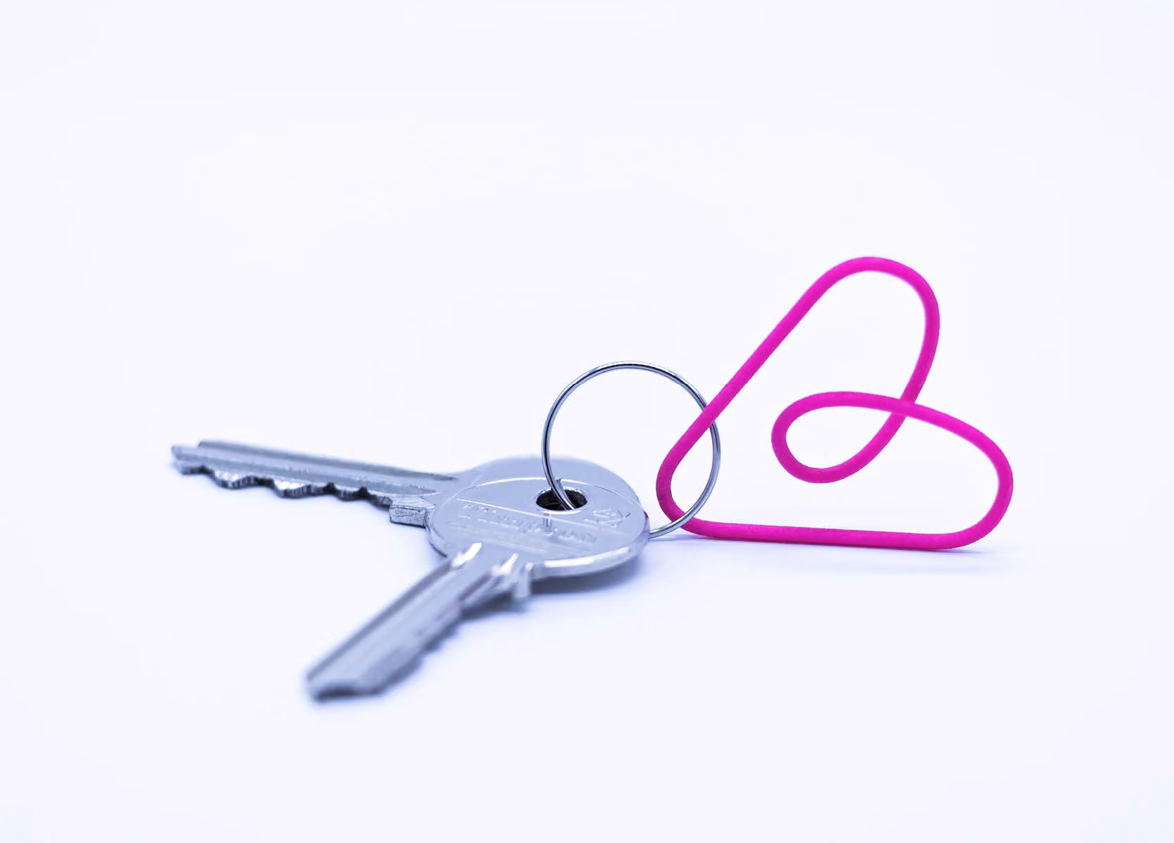 Airbnb key ring on white background