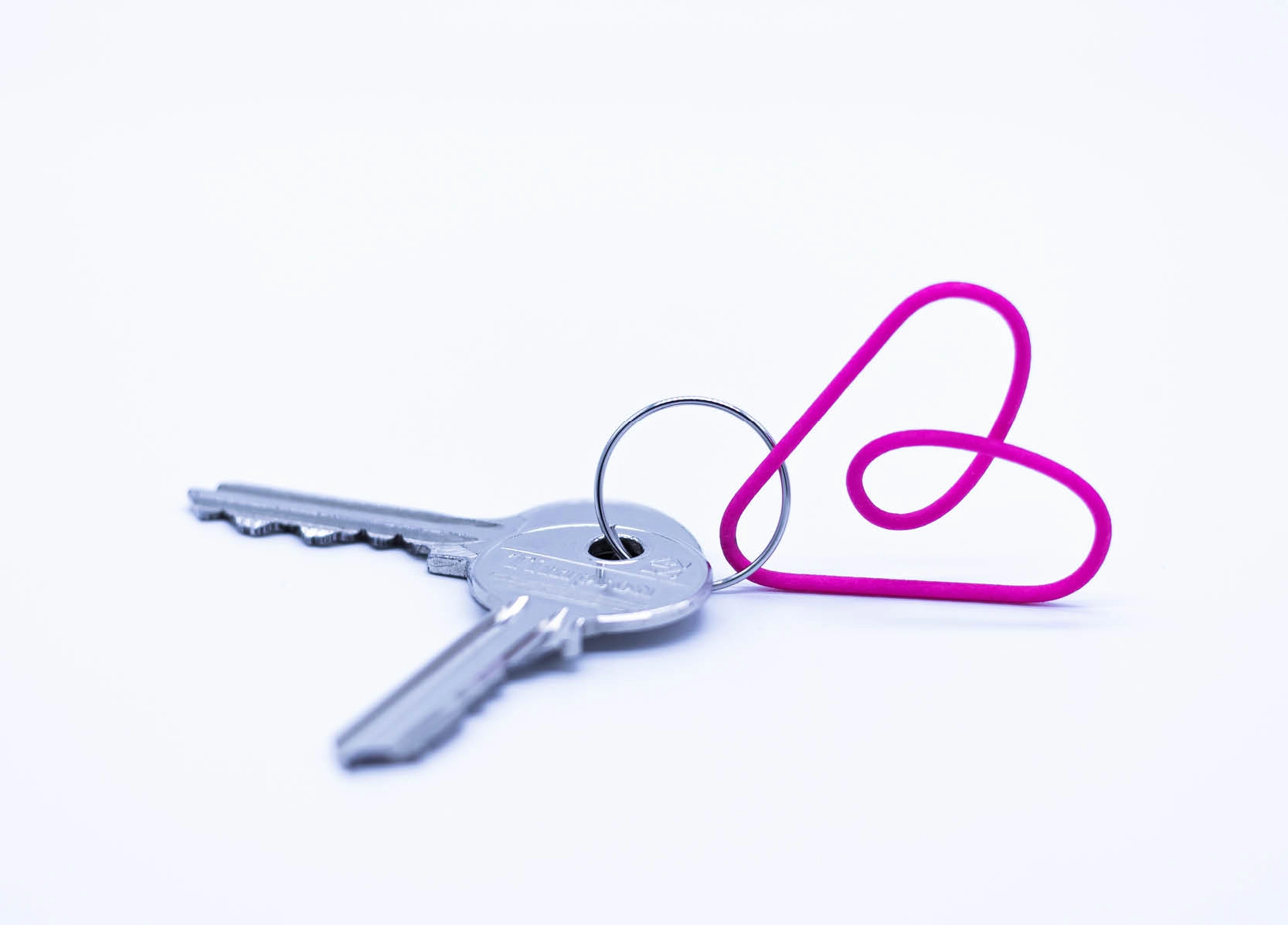 Airbnb key ring on white background