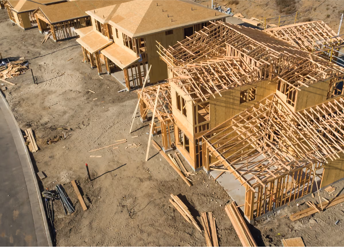Aerial view of a row of new homes being built