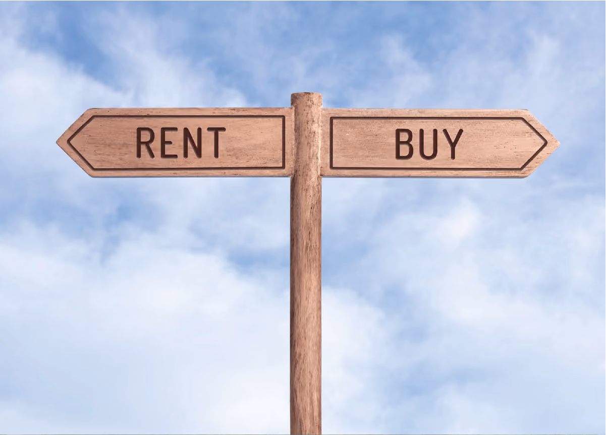 "Rent" and "buy" signs facing opposite directions with sky background