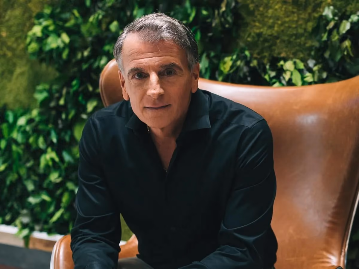 A photo of Stephan Tchividjian sitting on a leather couch