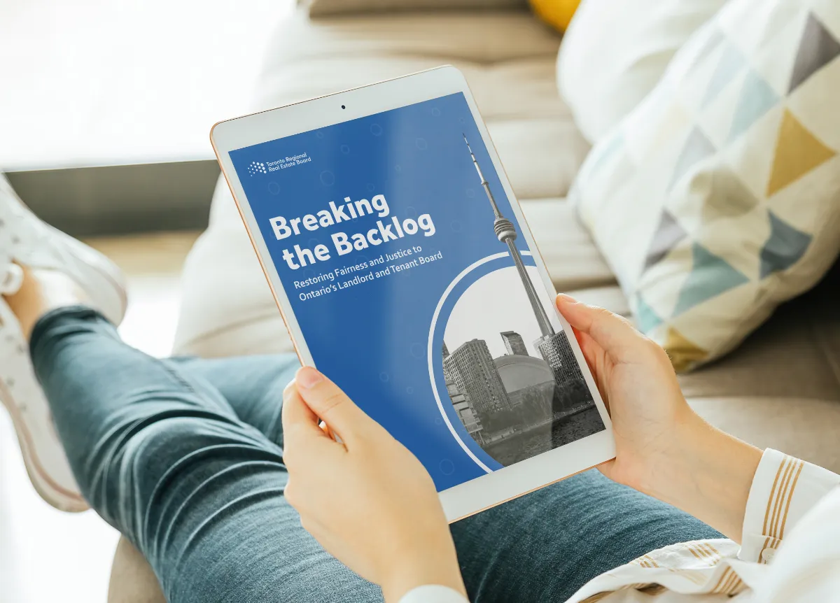 TRREB report cover on a smartphone screen